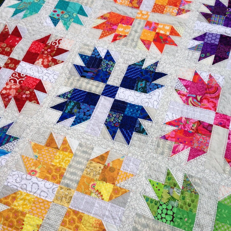 A colorful modern Bear's Paw quilt
