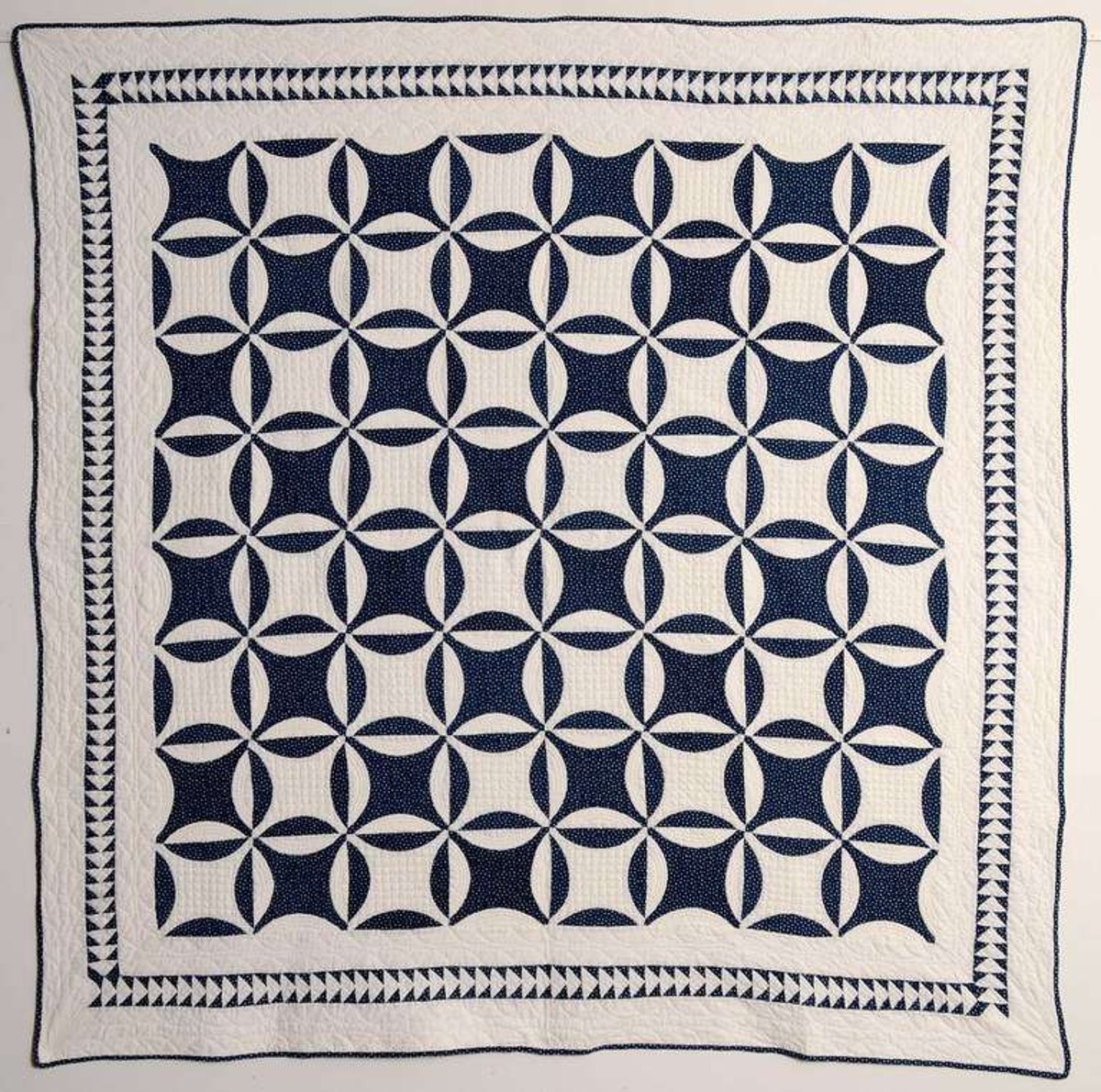 A blue and white Rob Peter to Pay Paul quilt